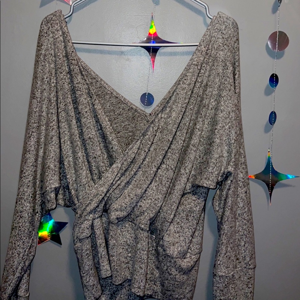 it’s from express , it’s a size medium , and it’s grey.